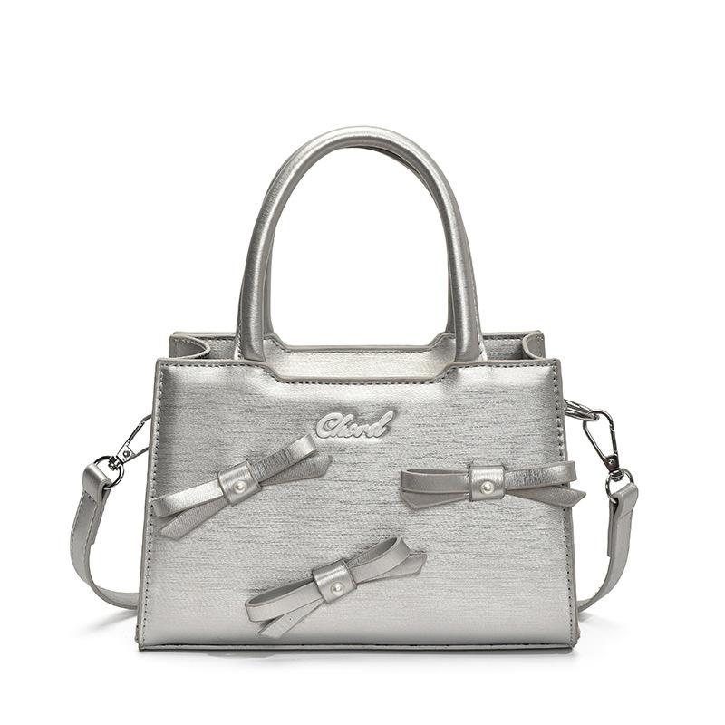 Корейская версия сумки-банта маленькой квадратной формы женская 2025 лето новая простая и модная ручная женская сумка женская на плечо через плечо