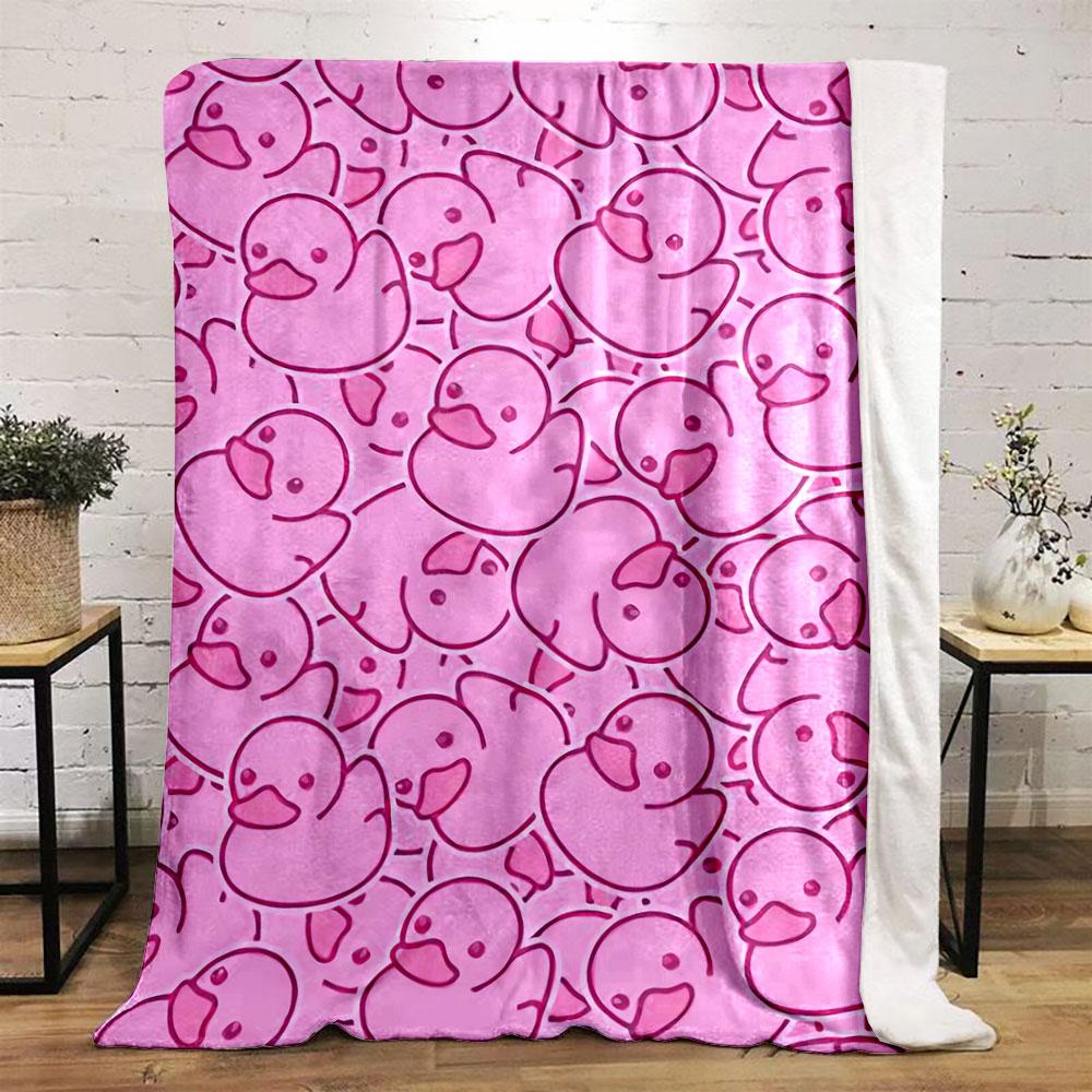 Repeating pink rubber duck shapes outlined in darker pink lines. for all seasons blanket lunch break throw gift
