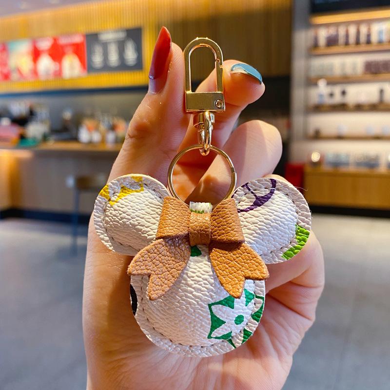Изысканный классический кожаный брелок-подвеска для автомобиля в виде старого цветка с милым шариком и мультяшным мехом кролика рекс для женских сумок