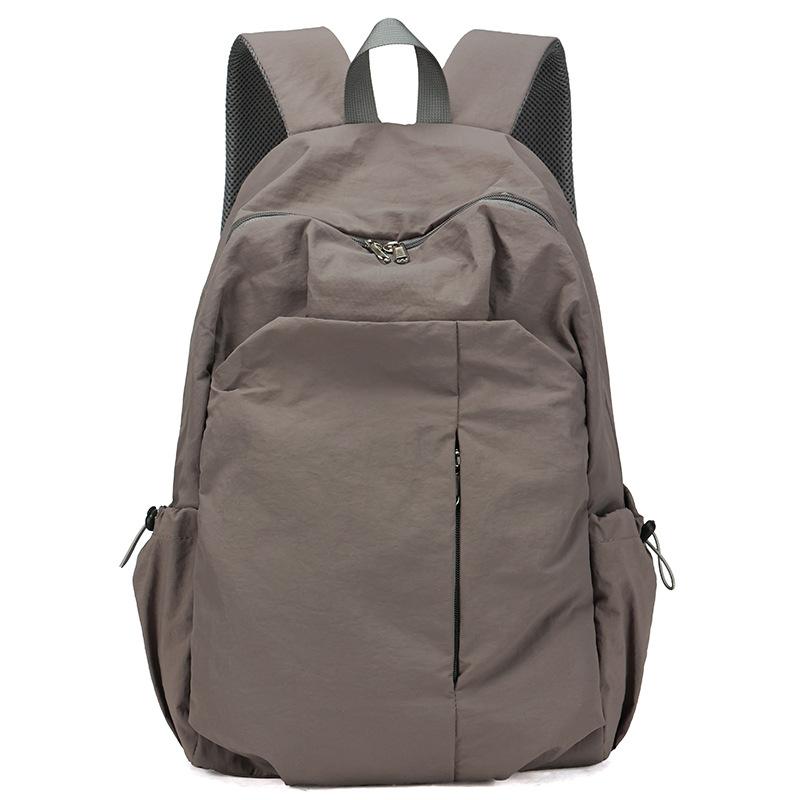 Schoolbag1011 New large-capacity backpack, male and female students schoolbag, multi-functional travel bag, casual and simple commuter bag