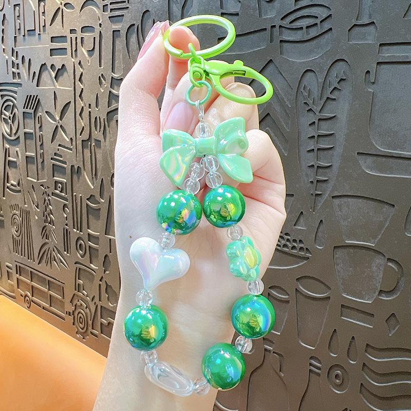 Брелок для ключей с разноцветными конфетами, бисером, бантом и сердечком