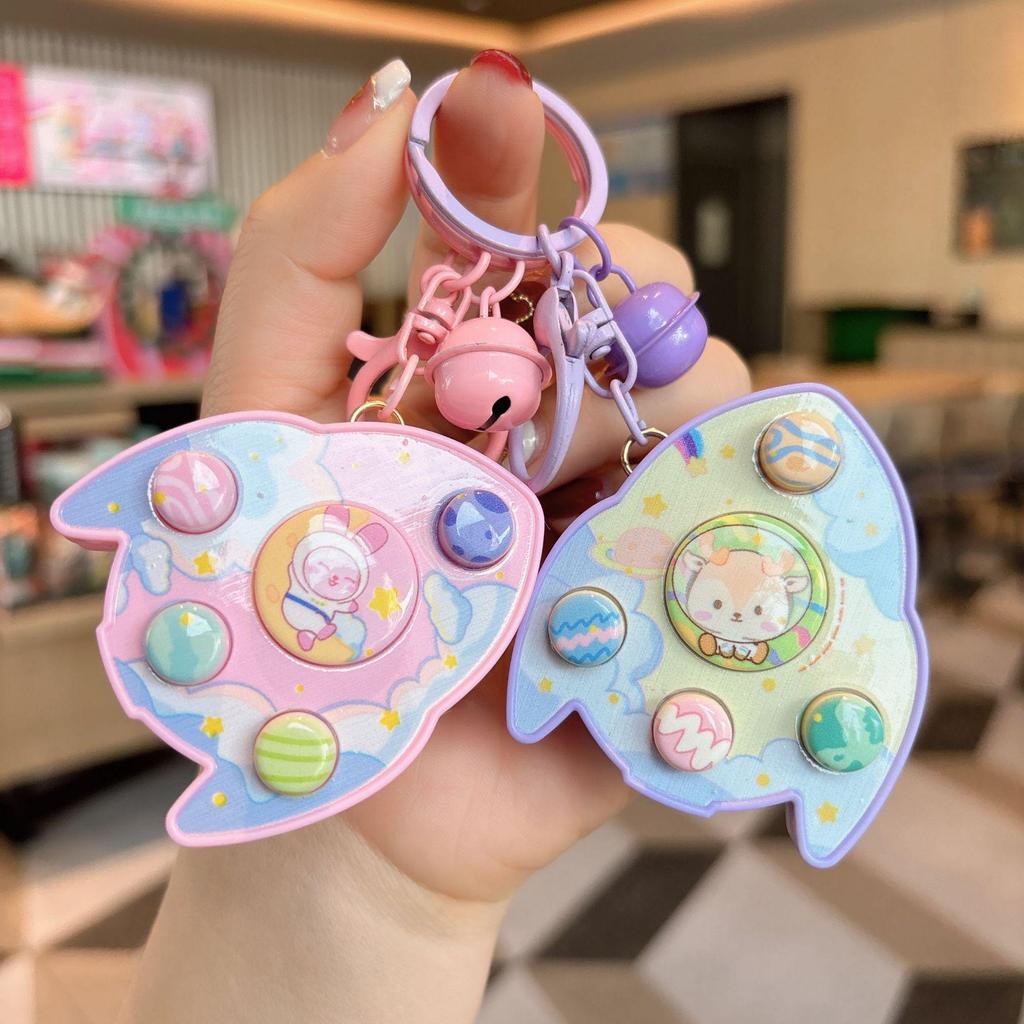 Creative Luminous Cartoon Rocket Game Console Keychain with Sound Effects & Claw Machine Decompression Pendant Gift
