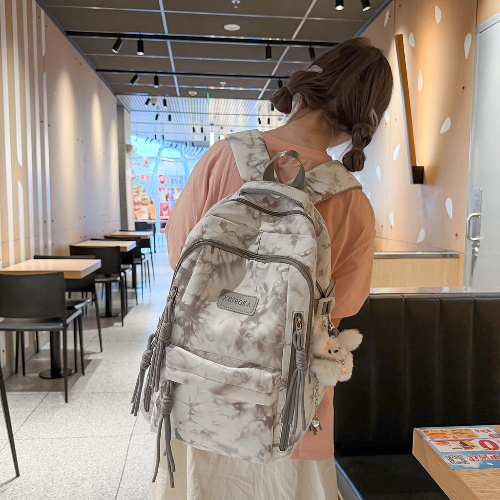 Schoolbag new niche design tie-dye schoolbag female junior high school student lightweight backpack college student leisure travel printed backpack
