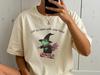 Off To Mess With Your Head Witchy Frog On Scooter Tee — Sarcastic Feminist Humor Shirt