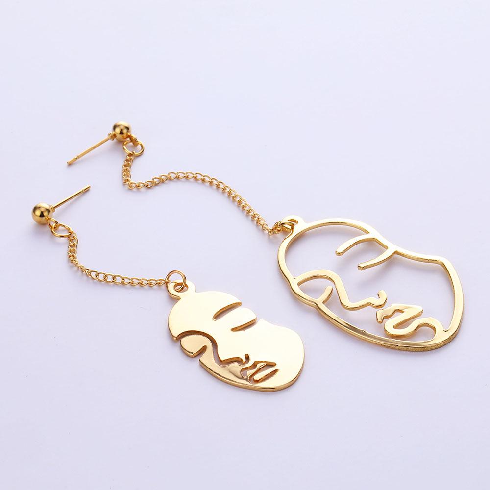 Серьги в виде лица на цепочке