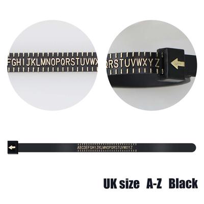 Измеряет размеры колец с помощью руководства, включая таблицу размеров колец для мужчин и женщин