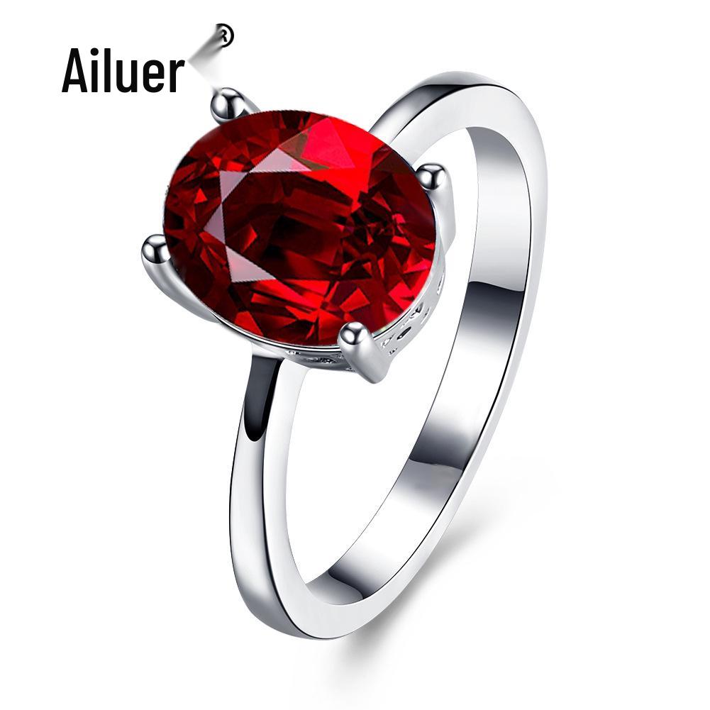 Женское кольцо-бестселлер из белого золота с овальным цирконом и кристаллами