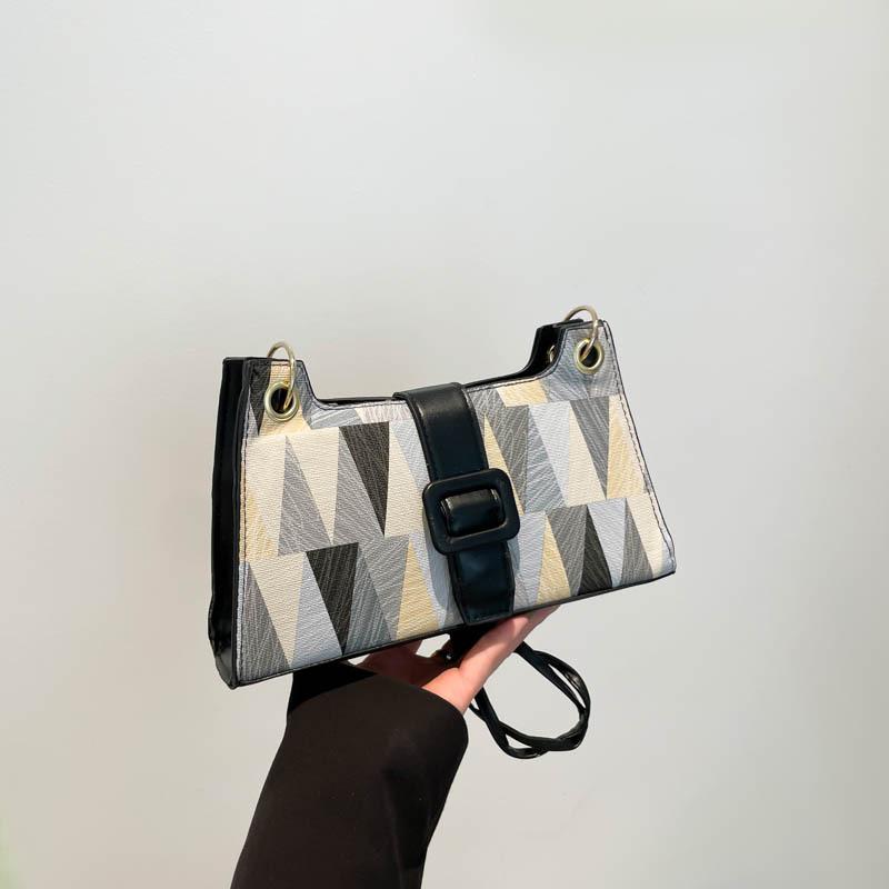 Маленькая сумка высокого класса, женская весна 2025, новая модель, популярный нишевый дизайн этого года, сумка на плечо/подмышку, универсальная сумка-мессенджер