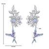 Silver hummingbird earrings with flowers, 925 silver studs