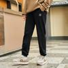 Li Ning Sports Lifestyle Series Модные простые трикотажные спортивные брюки с эластичной резинкой на талии, женские плавки, черные AKLU868-3