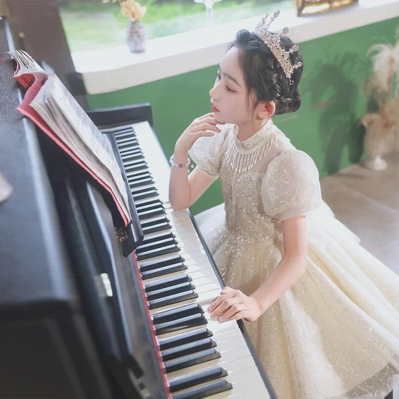 Стильное зимнее платье принцессы 2024 года для девочек: Элегантный костюм для выступления девочки-цветочницы и фортепиано
