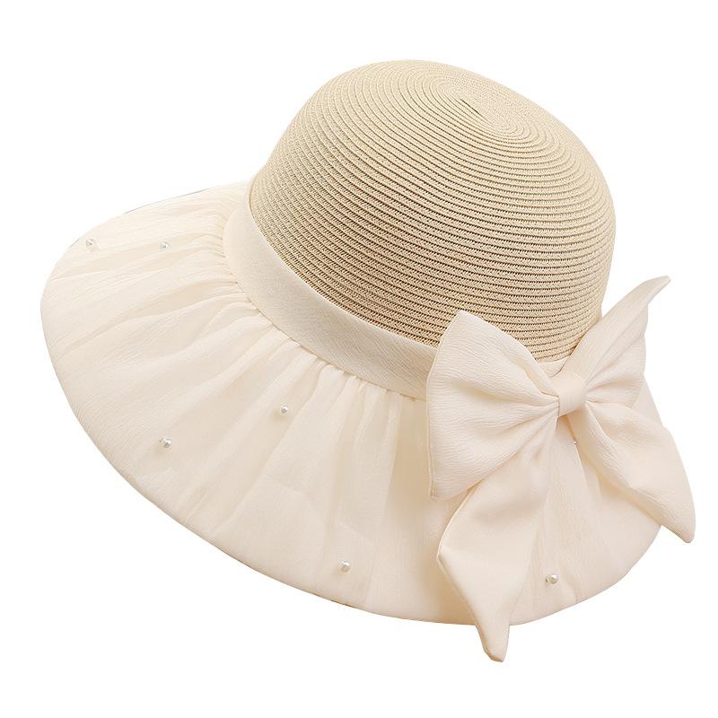 Spring and summer new women's straw hat big brim sun hat French pearl bow versatile sun protection hat travel