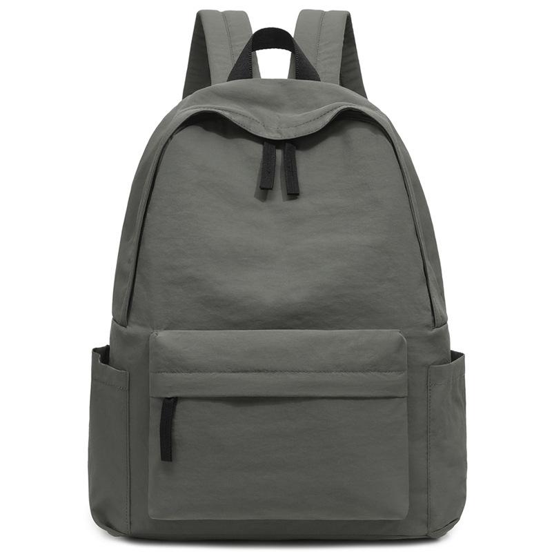 Schoolbag1011 New Fashion Casual Backpack Lightweight Versatile Anti-splashing Outdoor Sports Backpack Men's and Women's Commuter Backpack