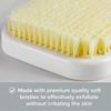 Exfoliating back brush for hands-free shower use