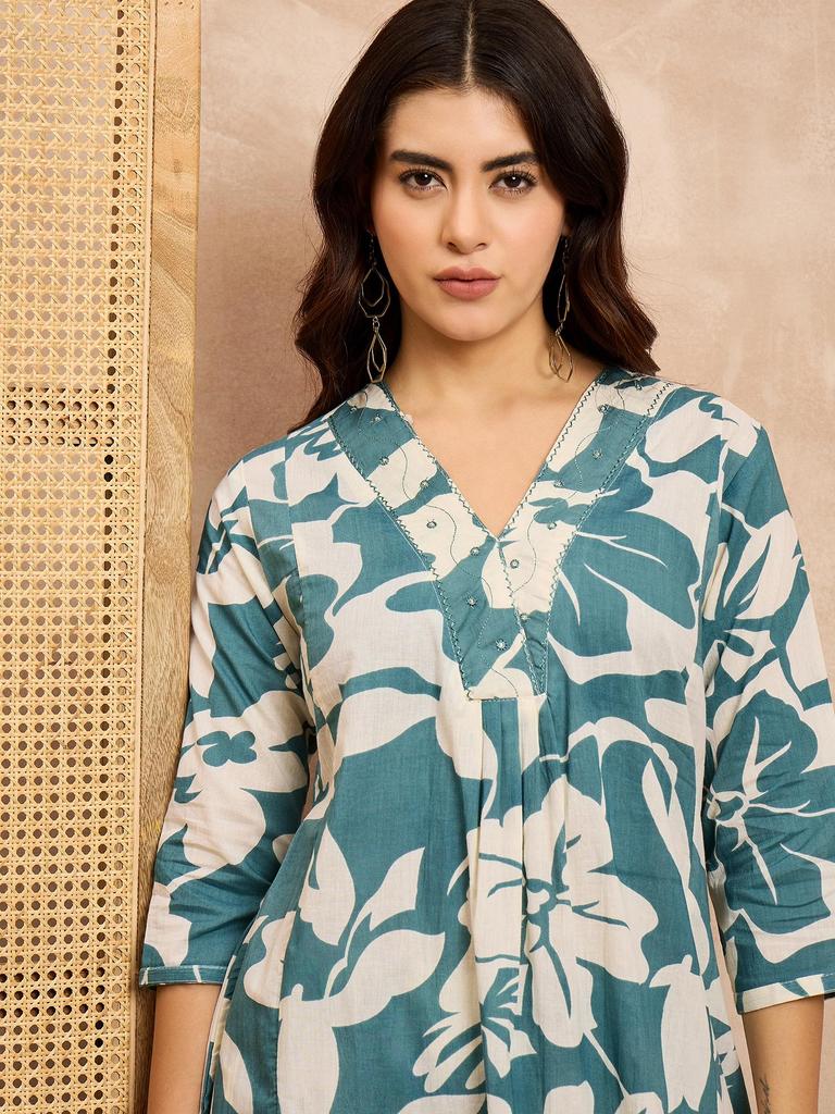 Туника А-силуэта с цветочным принтом и комплекты палаццо