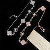 Natural Pink Shell Four Leaf Flower Zircon Drawable Bracelet with Female Hollow Design, Elegant and Luxurious Handpiece