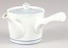 This lightweight teapot features a sleek white base with blue Its diameter is its capacity is and its comfortable handle makes it easy to It also