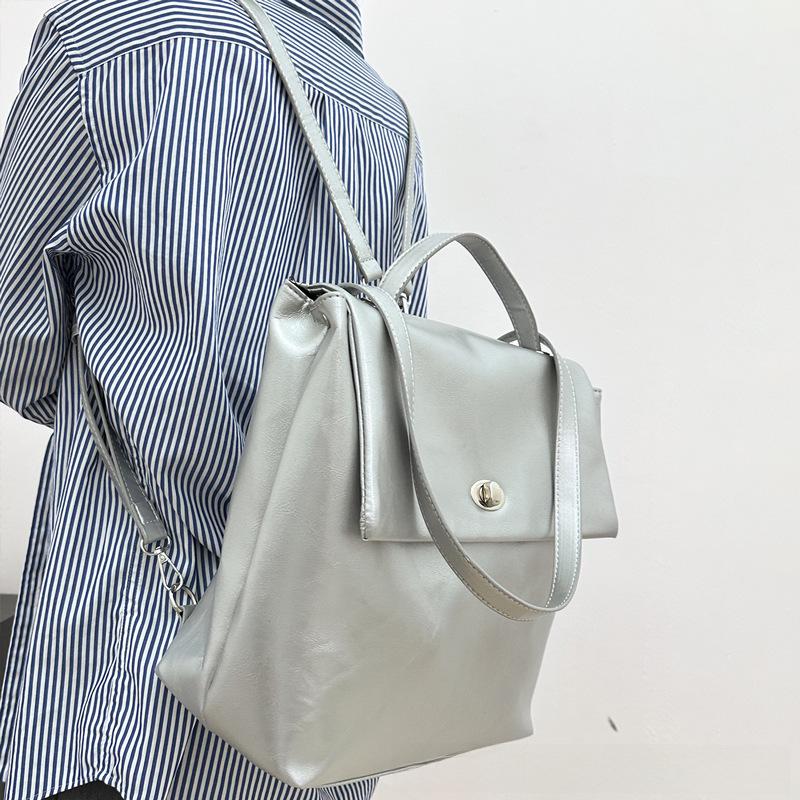 Модный корейский серебристый рюкзак 2025 года: Большая вместимость, повседневный и универсальный вариант для летних поездок женщин на работу