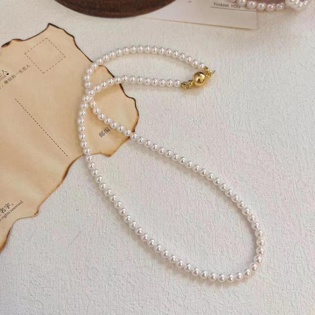 Elegant Magnetic Pearl Clavicle Necklace – High-End Versatile Sweater Chain for Women