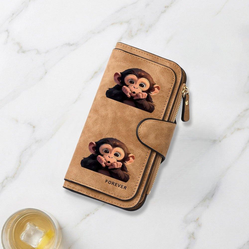 Printed long wallet with a close-up image of a surprised little monkey. Multifunctional portable coin purse with snap closure. Unisex, suitable as a