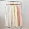 Spring/Summer 2025 Korean-Style Yellow Midi Skirt: Milky Tone, High-Waisted, A-Line, Fashionable, Versatile, Loose Fit for Women