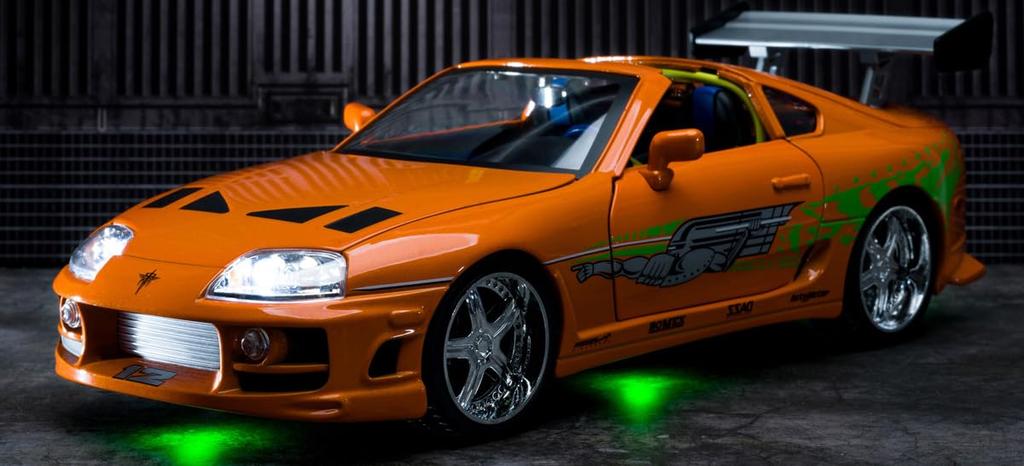 Jada Toys Fast and Furious Series 1995 Toyota Supra Orange with Brian Finished Product 1/18 F&F (Brian) Figure/Lighting