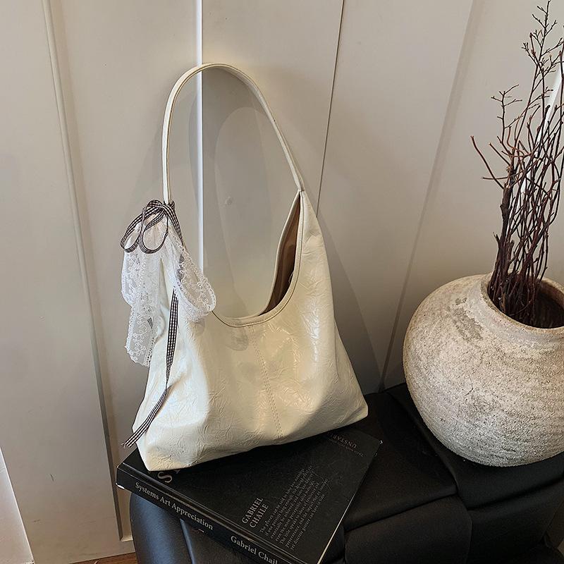 Повседневная простая вместительная сумка через плечо женская 2025 весна новый тренд модный нишевый дизайн сумка-тоут для поездок