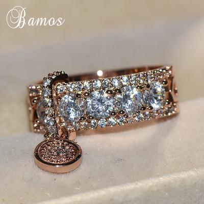 Массивное женское кольцо усыпанное кристаллами с подвеской