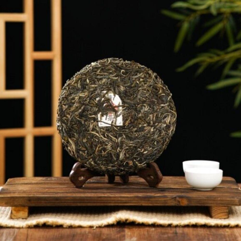 Сырой пуэр Чай Ледяной остров Учжай Весенний Древнее дерево Юньнань Чайный блин