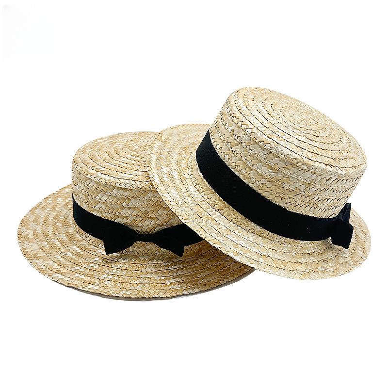 Parent-child hat Korean version summer beach hat women's bow flat edge sun protection straw hat outdoor flat top sun hat