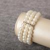 3-Row Faux Pearl Bracelet Women Retro Wrist Bracelet Ladies Rhinestone Stretch Bracelet with Elastic Chain Jewelry for Parties Weddings Daily Wear