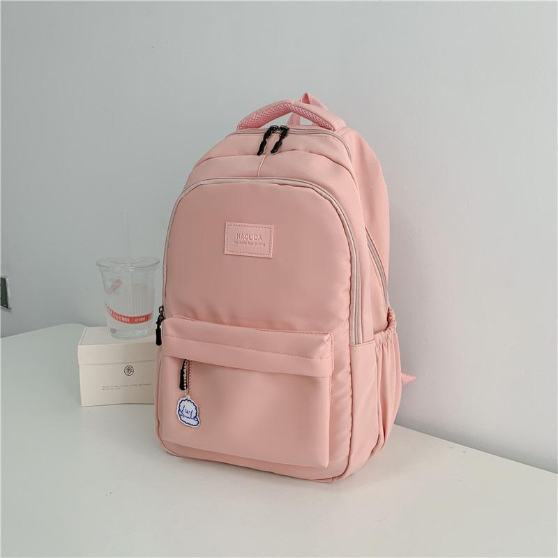New simple solid color schoolbag simple high school student junior high school student backpack large capacity computer backpack
