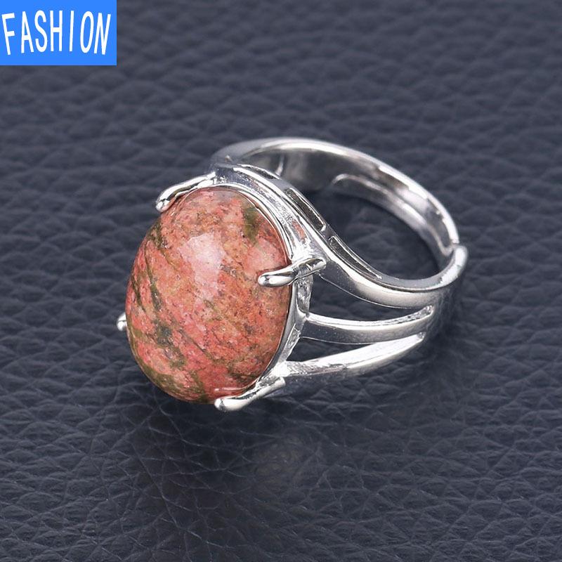 Oval Natural Crystal Four-claw Inlaid Hollow Ring