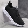 New versatile low-top sports fly-woven shoes, four-season large-size lightweight solid-color breathable casual running shoes