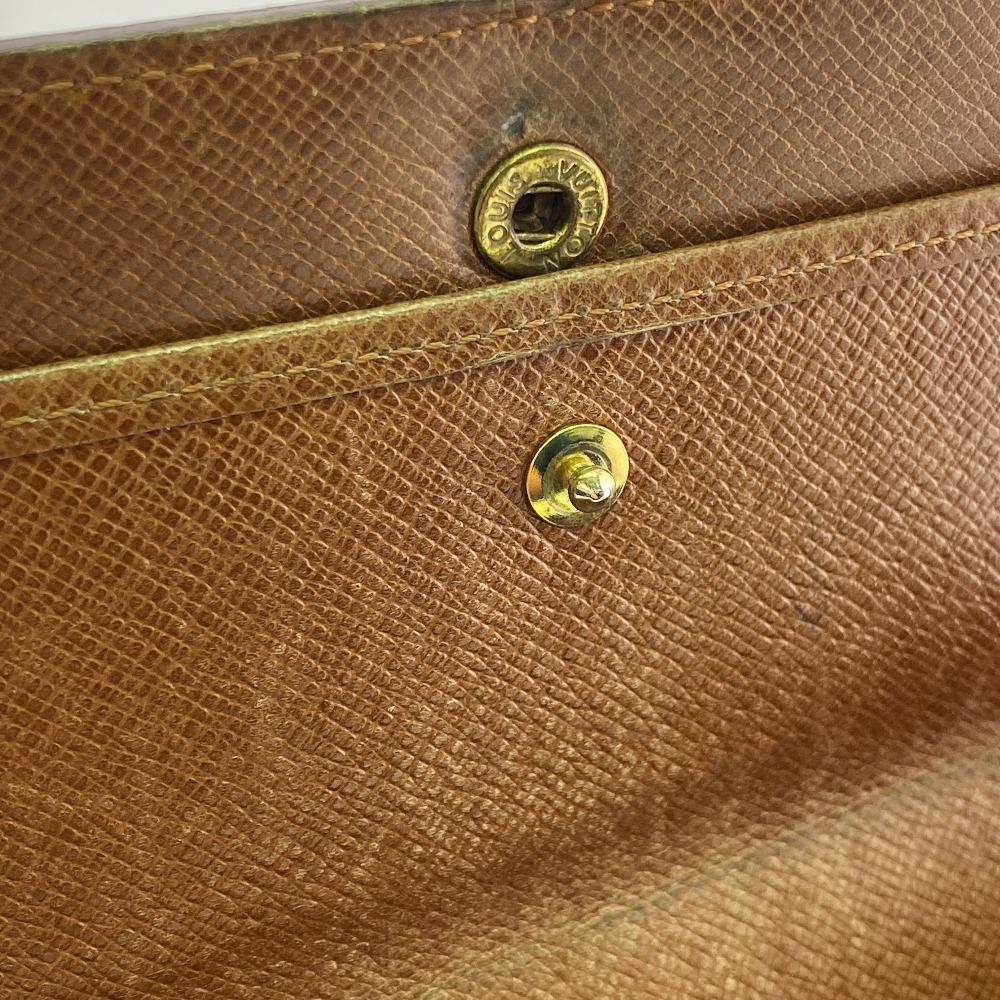 Louis Vuitton M61215 Monogram Monogram Porte Tresor International Трехскладной кошелек Коричневый Monogram Б/у