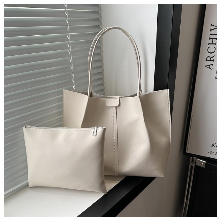 Korean Version of Solid Color Simple Niche Design Versatile Sewing Line Bag Women's Bag Is Popular This Year, Large-capacity Shoulder Armpit Bag