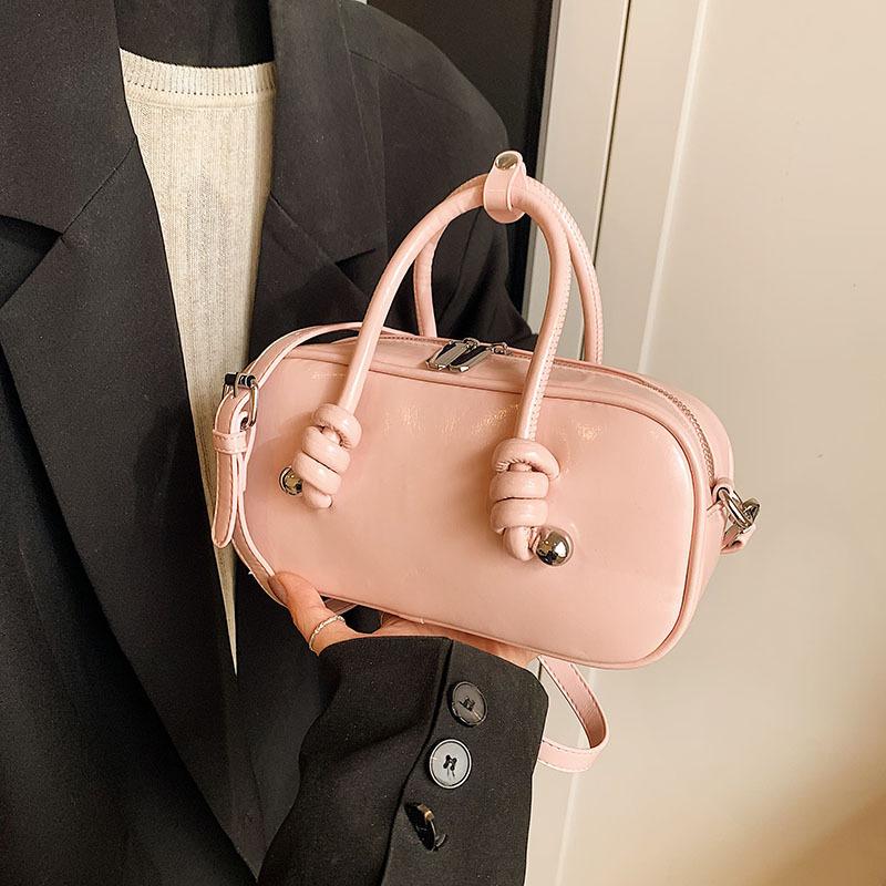Сумка-бостон в высоком стиле, женская модная нишевая модель 2025, новая весенне-летняя сумка-мессенджер, портативная сумка для боулинга