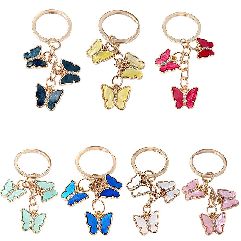 1 шт. Брелок из сплава Женские подарки Брелки Чехол для наушников Аксессуары Брелок-бабочка Брелоки для сумок Рюкзаки Разноцветный