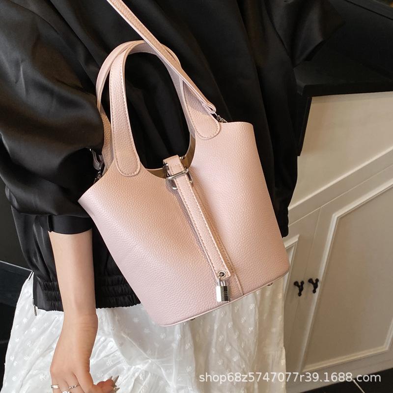 Korean Version of the Foreign Style Hand-held Bucket Bag Women's 2025 New Niche Design Mother and Child Bag Commuter Shoulder Crossbody Bag