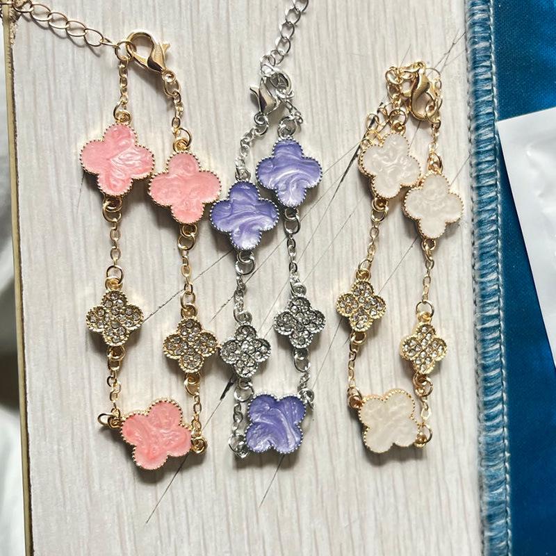 Браслет из циркония с четырьмя листочками клевера Sakura Pink - роскошные, броские украшения в стиле знаменитостей