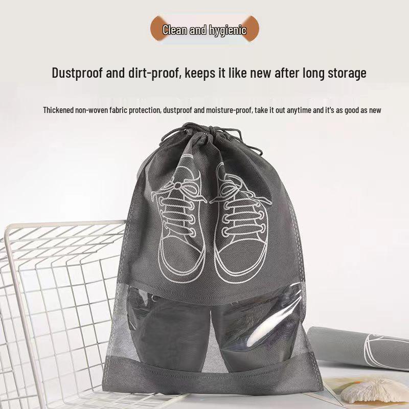 Dustproof & Moisture-proof Non-Woven Shoe Storage Bag with Drawstring for Travel Organization.