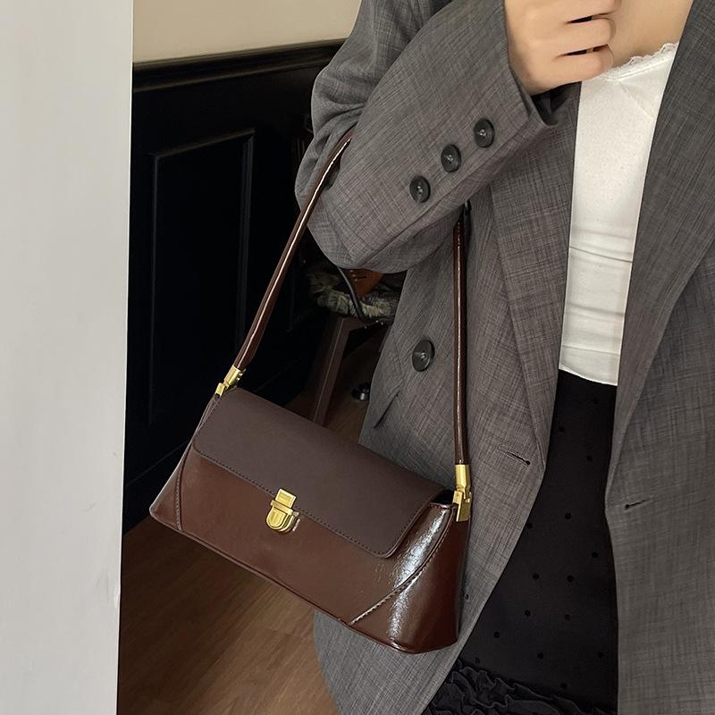 Премиальная французская нишевая сумка 2025 новая трендовая сумка-багет для ношения в руке или под мышкой, универсальная на плечо, повседневная сумка-багет