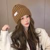 Удобная мягкая вязаная акриловая шапка для женщин с милым бантом, идеально подходящая для зимней и осенней моды.