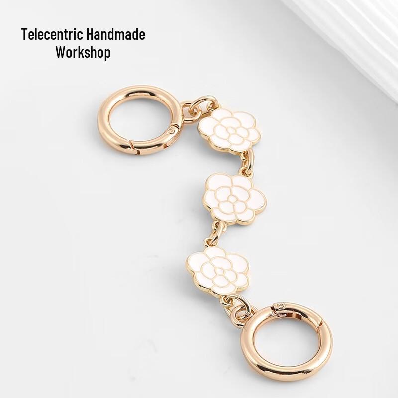 Удлинитель цепочки для сумки Coach Teri с подвеской-камелией