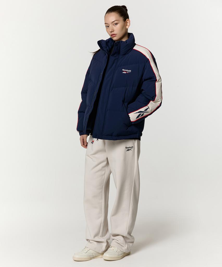 Reebok Классическая стеганая куртка Vector с панелями - Темно-синяя