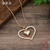 New Glossy Hollow Love Snake Bone Chain Long Pendant Women's Simple and Advanced Autumn and Winter Heart-shaped Long Necklace