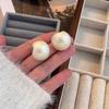 Серебряные игольчатые серьги-цепочки с красным бантом и жемчугом, осень/зима