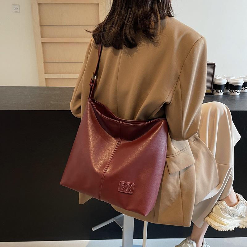 Премиальный стиль Новая осенне-зимняя сумка-ведро большой вместимости Премиальный стиль Нишевая наплечная сумка-подмышка Сумка-тоут