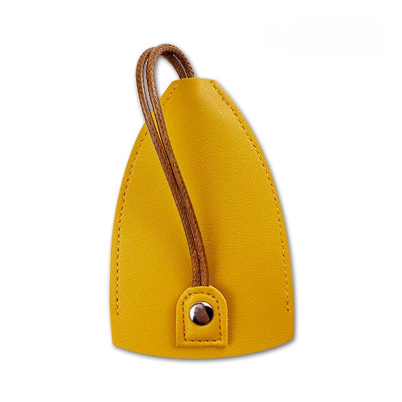 "Compact PU Leather Key Storage Pouch with Pull-Out Feature"