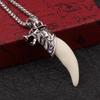 Мужское ожерелье с волчьим зубом: Властный кулон в виде клыка черной собаки на ретро-цепочке из титановой стали - Трендовый аксессуар для 2025 года.